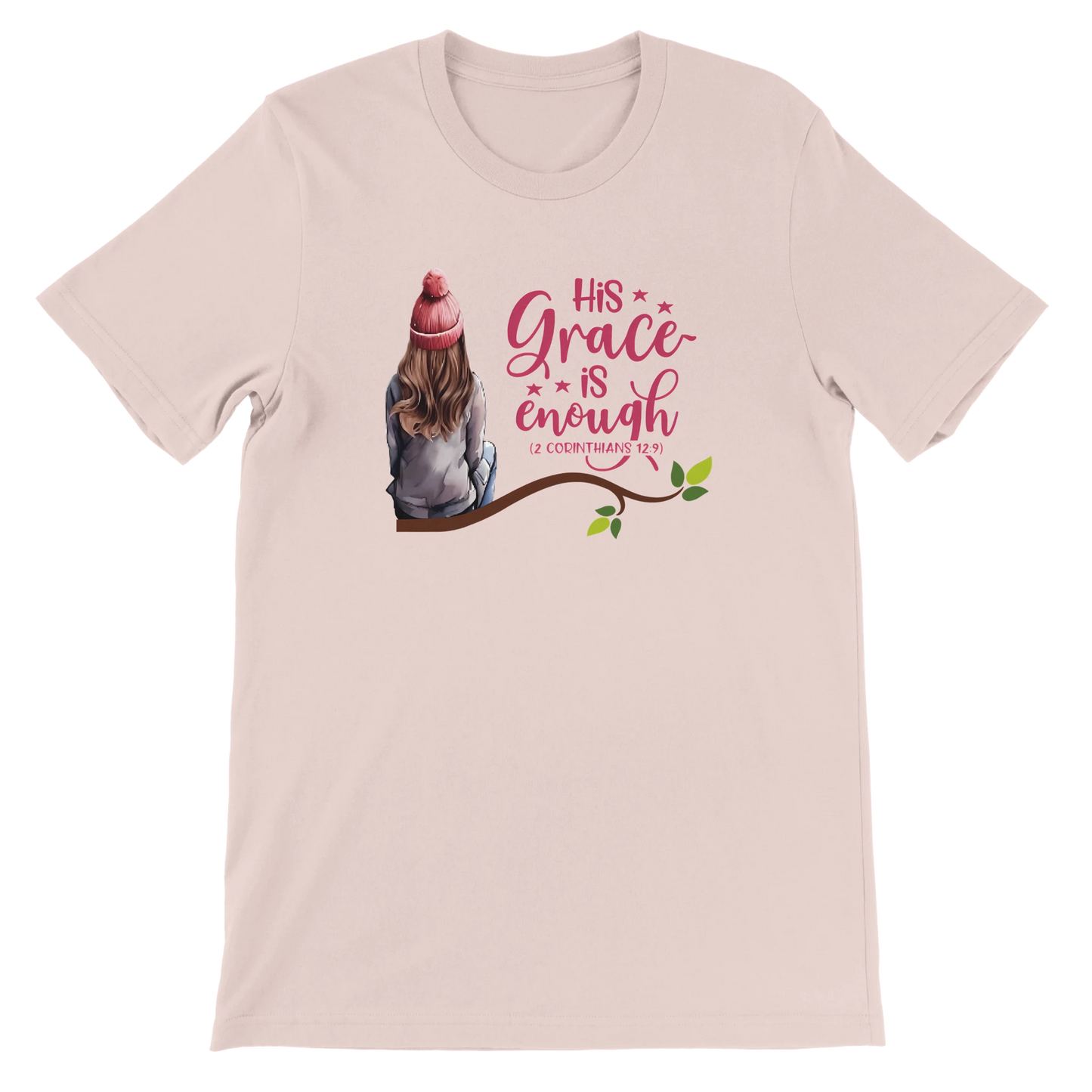 Soft pink t-shirt with a graphic of a girl sitting on a branch and text 'His Grace is Enough'