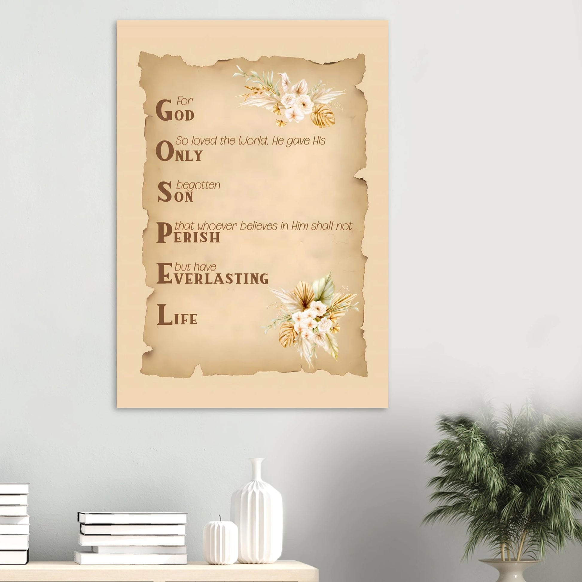 Decorative wall art with text and floral elements on a light gray wall.