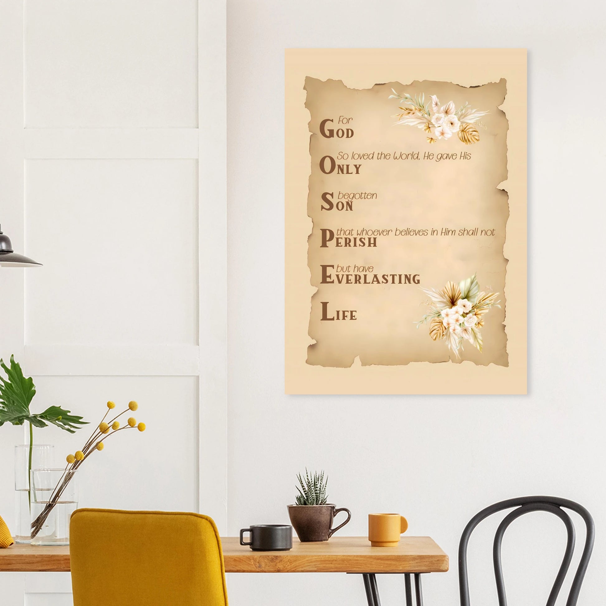 Poster with religious text and floral design on a wall above a table with decor items.