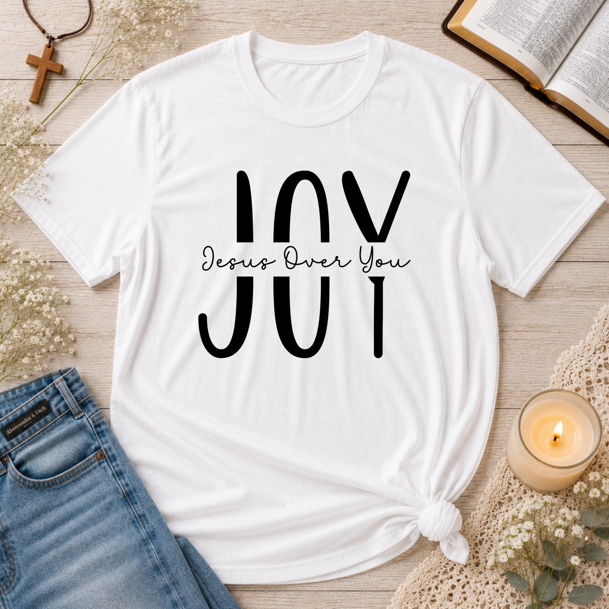 White JOY Christian T-shirt with minimalist Jesus Over You faith design inspired by Nehemiah 8:10.