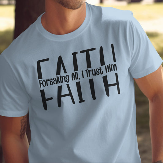 Light blue t-shirt with black text 'FAITH Forsaking All, I Trust Him FAITH' worn by a man.