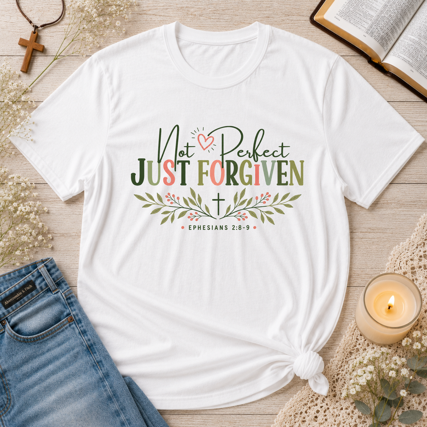 White Not Perfect Just Forgiven Christian T-shirt featuring a floral faith design inspired by Ephesians 2:8-9.