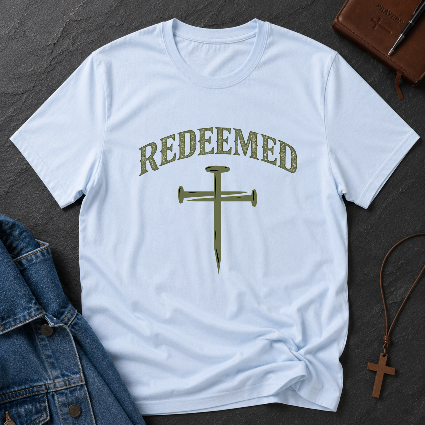 Light Blue Redeemed Christian T-shirt featuring a bold Redeemed faith design inspired by Ephesians 1:7