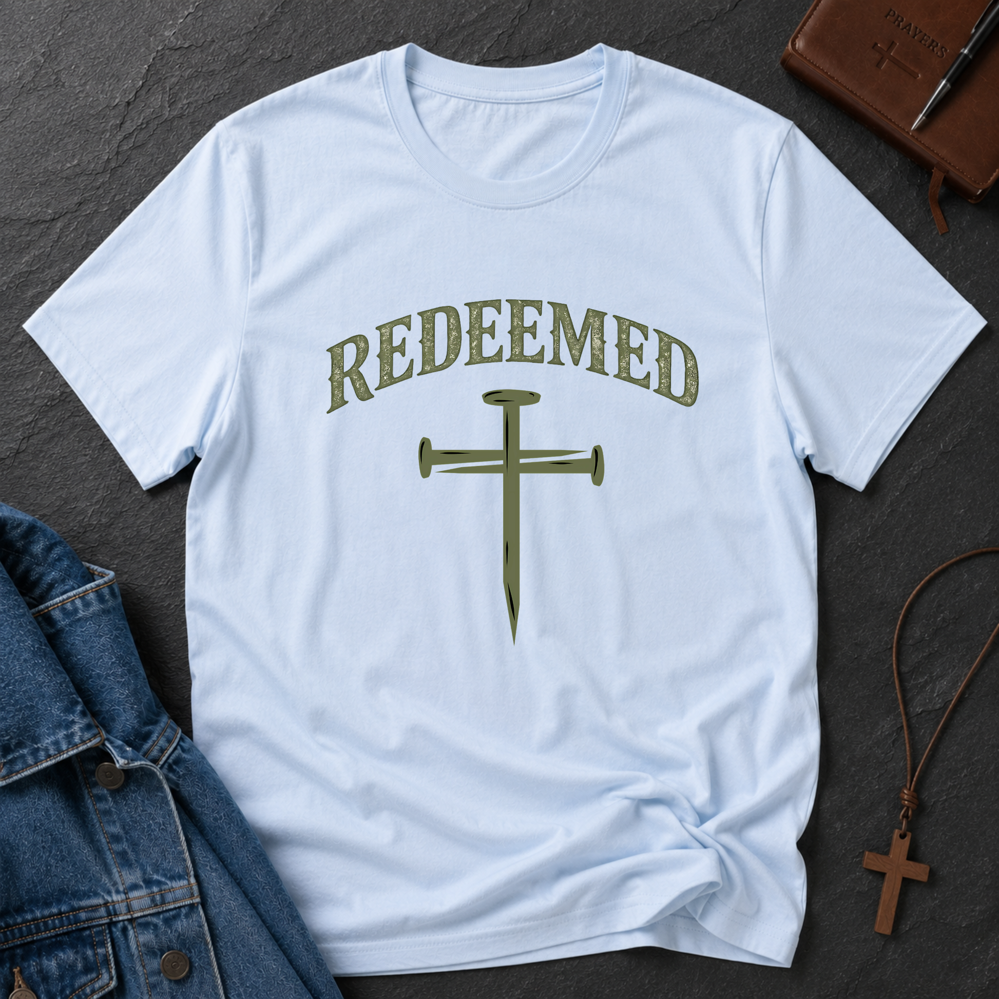 Light Blue Redeemed Christian T-shirt featuring a bold Redeemed faith design inspired by Ephesians 1:7